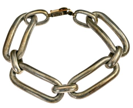 Chain Link Bracelet. Interlocking metal chains, with 14 k box clasp. Stamped "Arlene Altman 14K". 8 in.