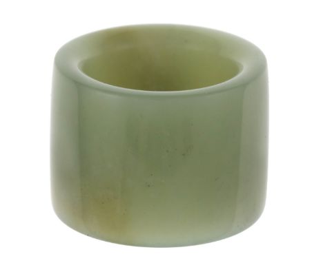 A Pale Green Jade "Archer's" or "Napkin" Ring. 1" high, 1" inside diameter; also a pale green jade ring. Size: 8 ¾. (2)