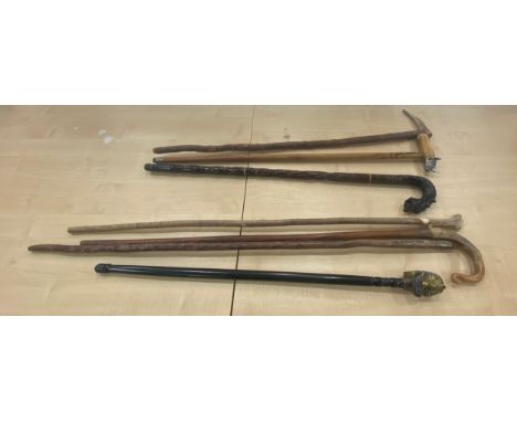 Selection of vintage novelty walking sticks 