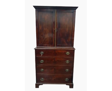 19th century mahogany chest on chest with moulded pediment, two cupboard doors raised upon a base of four long drawers, to br