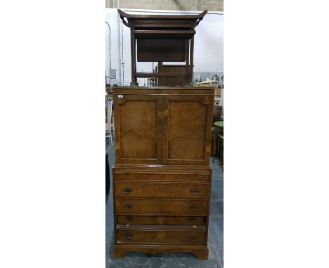 Queen Anne style burr walnut veneer cupboard, the pair of panelled doors enclosing shelves, with writing slide and four long 