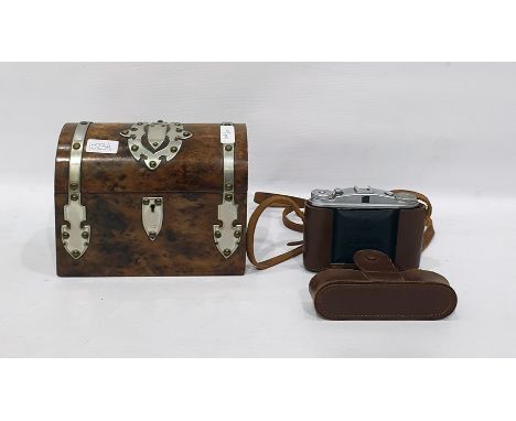 Burr walnut dome topped tea caddy, with white metal decorative bindings and embellishments together with an Isolette II camer