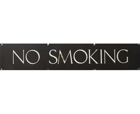Enamel sign "No Smoking" with white lettering on a brown ground, 66cm long 