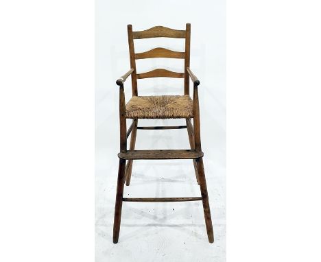 Vintage ladderback child's high chair with rush seat