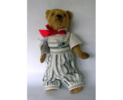 Early 20th century, possibly Chiltern, bear in striped dungarees