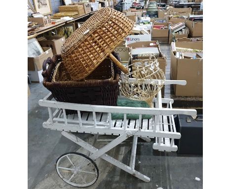 White painted florist's hand cart together with wicker baskets and a vintage style white painted wire hanging basket