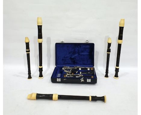 Buffet clarinet in case and a collection of Aulos recorders the model number is 293881