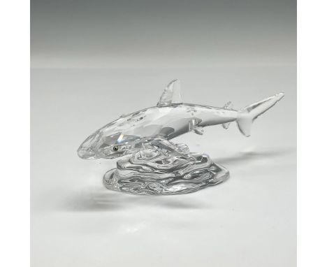 This clear crystal figural is part of the South Sea theme group. Swarovski backstamp. 7644 000 007. This item has its origina