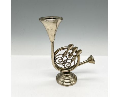 Creative holder for a music lover or wind instruments. Realistic design lends to this unique item. Dimensions: 4.25"L x 2"W x