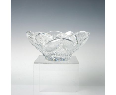 Mouth blown and hand cut pattern on a clear bowl with a scalloped rim. This item has its original box: 8"L x 7.75"W x 5"H. Is