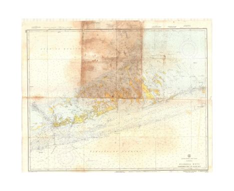 A color map depicting the land and sea area of the Sombrero Key to the Sand Key. Publishing stamp by "The U.S Coast and Geode