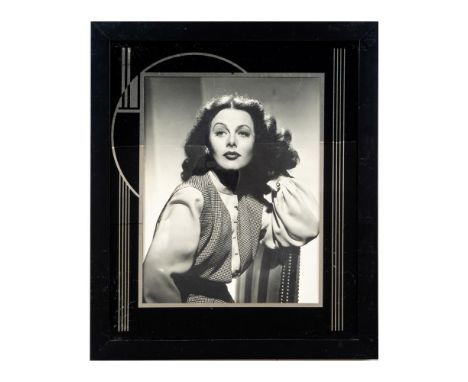 High quality photographic print depicting American actress Hedy Lamarr. Black frame with reflective art deco style borders. S
