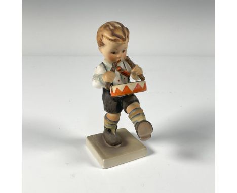 Hand painted porcelain figurine of a marching little drummer boy. Impressed mark 240 and 1955. Backstamped Western Germany in