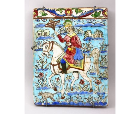 A GOOD 19TH CENTURY ISLAMIC PERSIAN QAJAR MOULDED POLYCHROMED POTTERY TILE, depicting a woman holding a parasol on horseback,