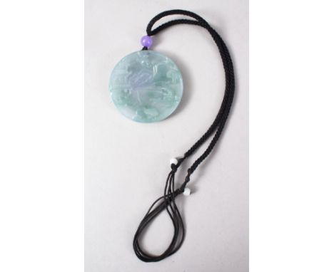 A GOOD LATE 20TH CENTURY CHINESE CARVED JADE PENDANT, the pendant depicting scenes of a fisherman in his boat at waterside, c