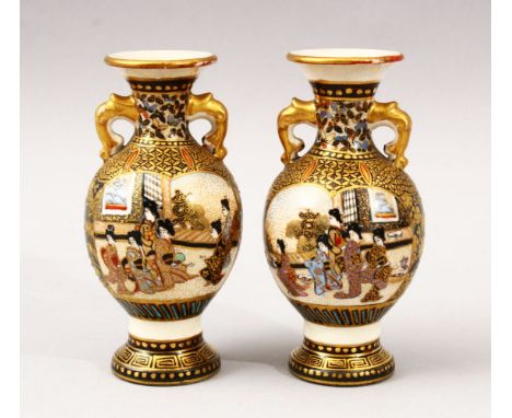 A GOOD PAIR OF SMALL JAPANESE MEIJI PERIOD SATSUMA TWIN HANDLE VASES, with panel decoration depicting figures in landscape sc