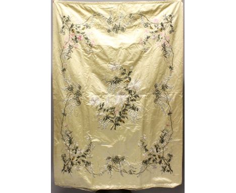 A 19TH CENTURY CHINESE EMBROIDERED SILK PANEL OF FLORA, depicting a continuous band of native flora, with central embroidered