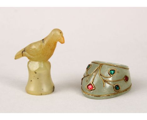 A GOOD CARVED AGATE FIGURE OF A BIRD, 5cm high with a carved jade ring, inlaid with wire and stones, 4.5cm. (2)