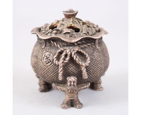 A SMALL ORIENTAL BRONZE LIDDED CENSER / KORO, the feet formed from three boys holding a sack, the lid pierced and decorated w