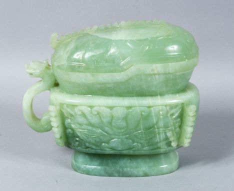 A LARGE 19TH / 20TH CENTURY CARVED JADE POT &amp; COVER, carved in the form of a sauce boat, with a cover, the handle formed 