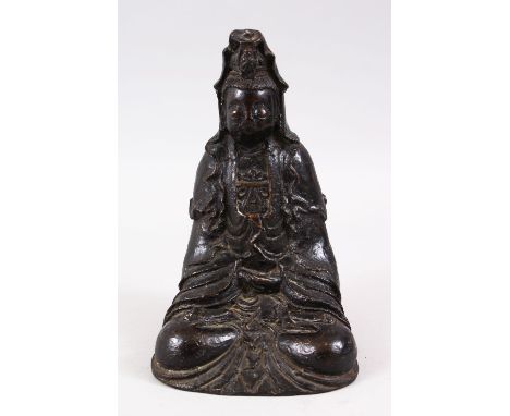 A GOOD 18TH / 19TH CENTURY CHINESE BRONZE FIGURE OF GUANYIN, in a seated meditating pose, the base hollow, 22cm high x 12cm w