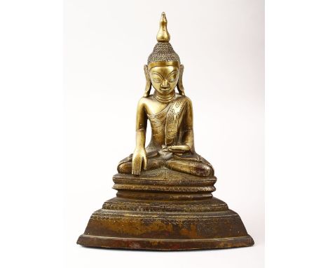 A GOOD INDIAN GILT BRONZE BUDDHA, seated in the meditative position, 20.5cm high, 15.5cm wide.