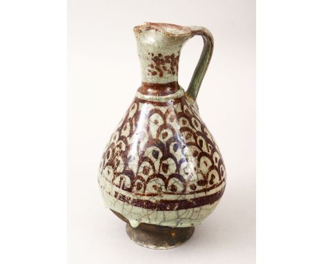 A 14TH/15TH CENTURY SYRIAN POTTERY JUG, with drip finished glaze at the base, with painted fish scale decoration and lustre g