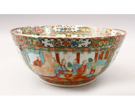 A 19TH CENTURY CHINESE CANTON FAMILLE ROSE PORCELAIN BASIN / BOWL, with panel decoration depicting figures interior and birds