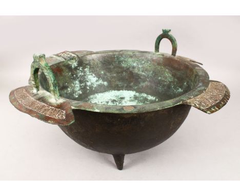 AN 11TH/12TH CENTURY ISLAMIC KHORASSAN BRONZE CAULDRON WITH SILVER INLAID INSCRIPTIONS, of hemispherical form with two handle