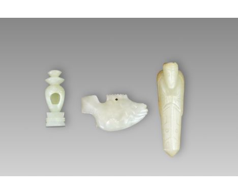 comprising a celadon jade fish pendant in Song style; a fine archaistic russet and celadon jade Immortal, the lower body term