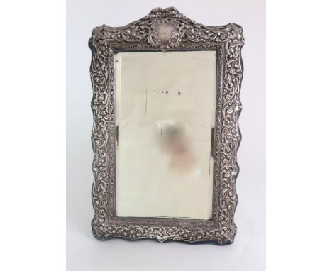 A LATE VICTORIAN SILVER-MOUNTED EASEL MIRROR with cartouche, monogrammed, CGB, Birmingham, 1900, 39 x 25cm Condition Report: 
