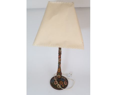 A CARVED WOOD AND GESSO TABLE LAMP with painted floral decoration Condition Report: minor gesso loss. shade worn and creased 