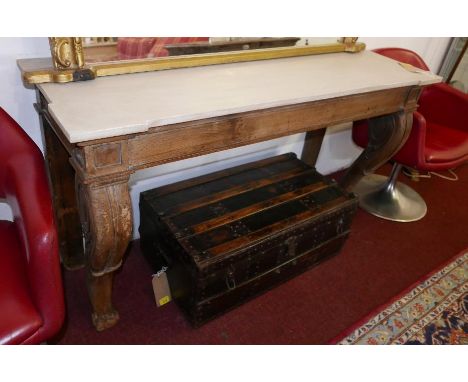 A Victorian oak carved console table, cabriole supports, with later top, raised on paw feet, H.80 W.139 D.50cm 