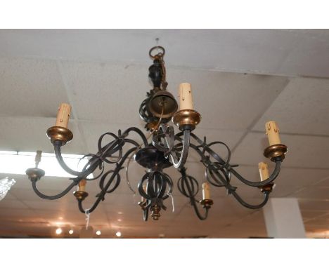 A large wrought iron 8 branch candelabra, 85cm diameter 