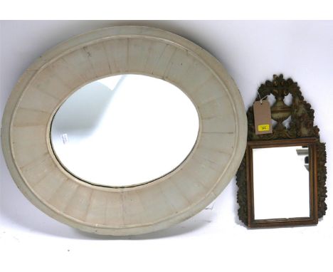 A vintage grey painted oval mirror with broad frame together with a continental mirror with urn crest 
