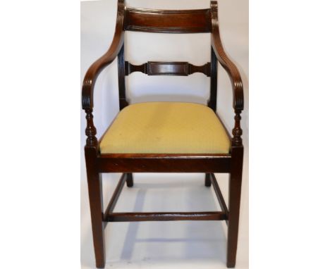 A 19th century mahogany desk chair, on square tapered legs joined by a stretcher, with drop-in light green upholstered seat 