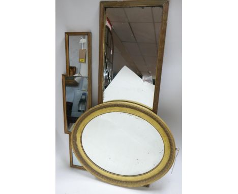 A rectangular gilt frame dressing mirror together with a gilt oval mirror and a 'over door' gilt mirror 