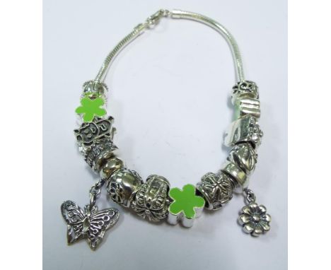 A silver and enamel Pandora style bracelet

Delivery at cost. Guaranteed UK postage for Christmas.