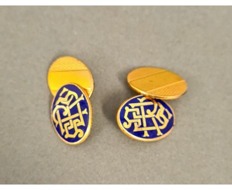 A pair of silver gilt and enamel cufflinks, FC Parry &amp; Co, Birmingham 1975, gross wt. 10.17g. 