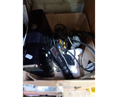 An Xbox 360 console with Knect and controllers, etc. 