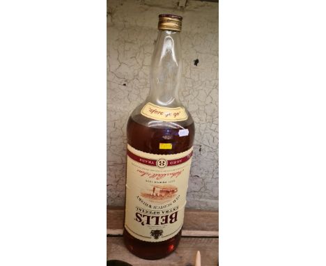 An imperial gallon ( 4.5L ) Bell's Extra Special old scotch whisky. 