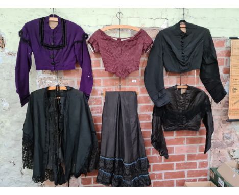 Six Victorian ladies clothing apparel pieces comprised of a silk skirt in sweepee round length, four silk bodices, three havi