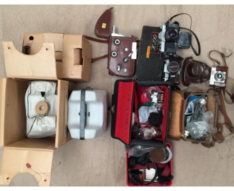VINTAGE FILM EQUIPMENT -CAMERAS/VOIGTLANDER/KODAK K-100/ILFORD PROJECTOR - An assortment of cameras and filming equipment to 