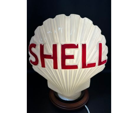 A Shell glass petrol pump globe, Continental, chips to neck. 