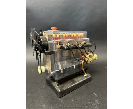 A Hornby battery-powered model of a four cylinder car engine, 9 1/2 x 8 1/4 x 4 1/2"