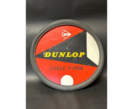 A Dunlop Cycle Tyres advertising board within tyre, 26 1/4" diameter. 