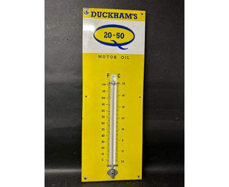 A Duckham's 20-50 Motor Oil enamel thermometer, 13 x 36". 
