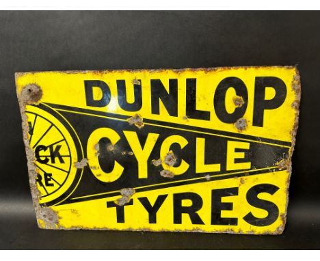 A Dunlop Cycle Tyres double sided enamel advertising sign, 22 x 14" - part of an original sign.