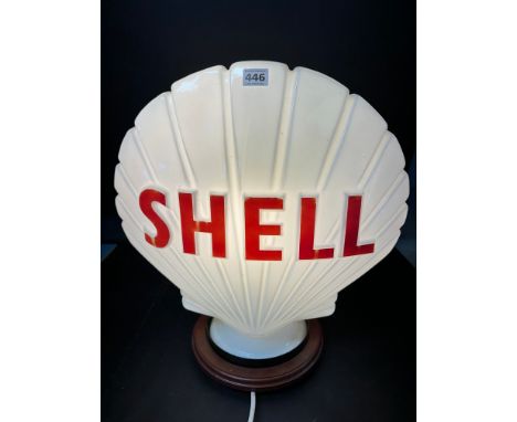 A Shell glass petrol pump globe by Hailware, dated July 1977.