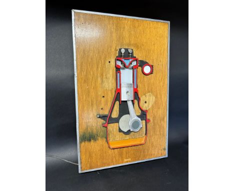 A teaching aid cabinet depicting a single cylinder engine with light-up mechanism. 